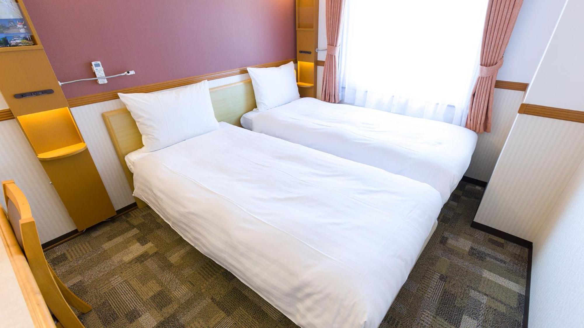 Toyoko Inn Yokohama Tsurumi Eki Higashi Guchi Rum bild